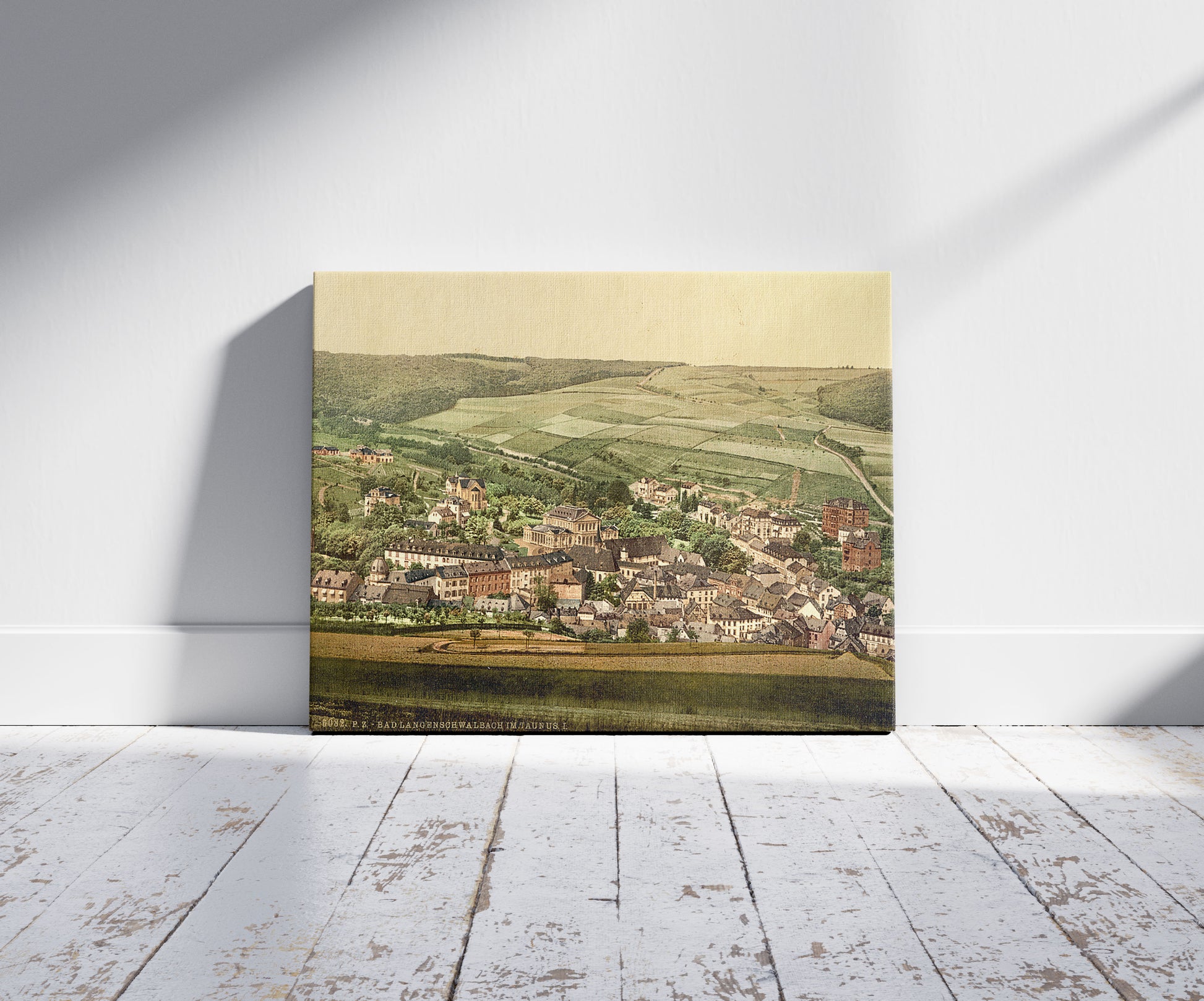 A picture of Bad Lengenschwalbach I., Wiesbaden, Hesse-Nassau, Germany, a mockup of the print leaning against a wall