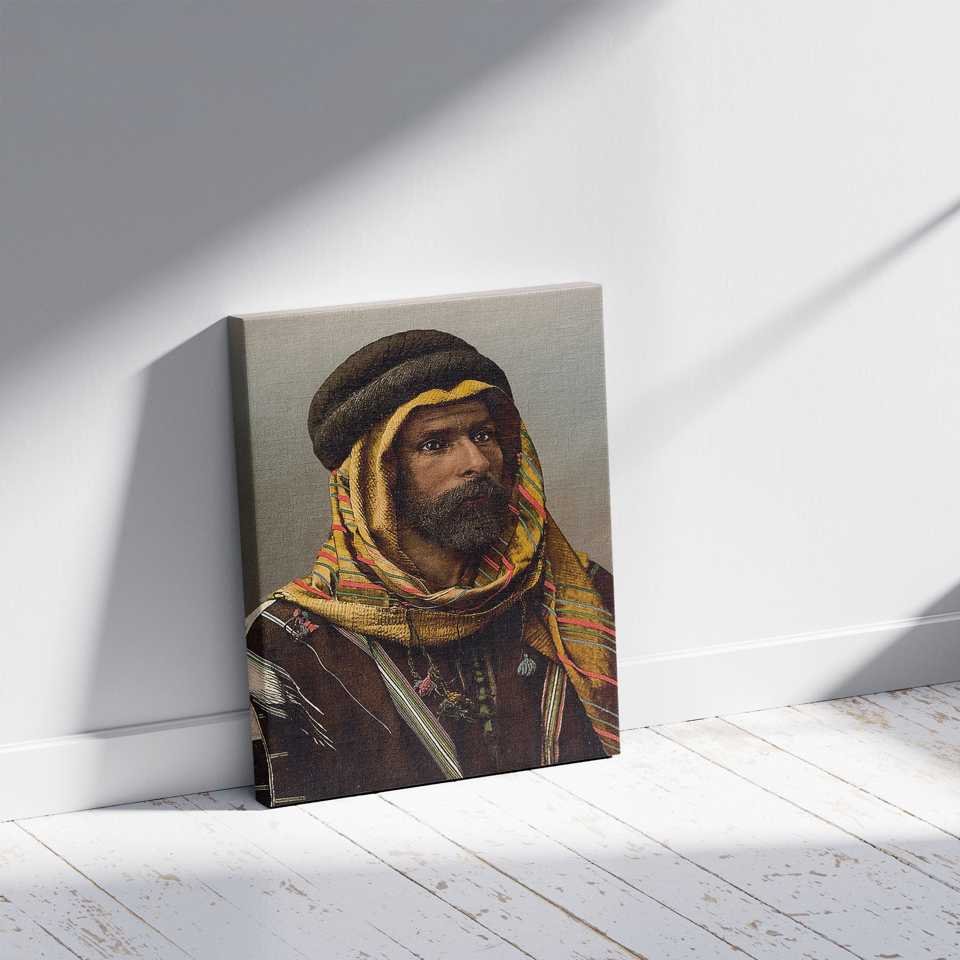 A picture of Bedouin Chief of Palmyra, Holy Land (i.e., Tadmur, Syria), a mockup of the print leaning against a wall