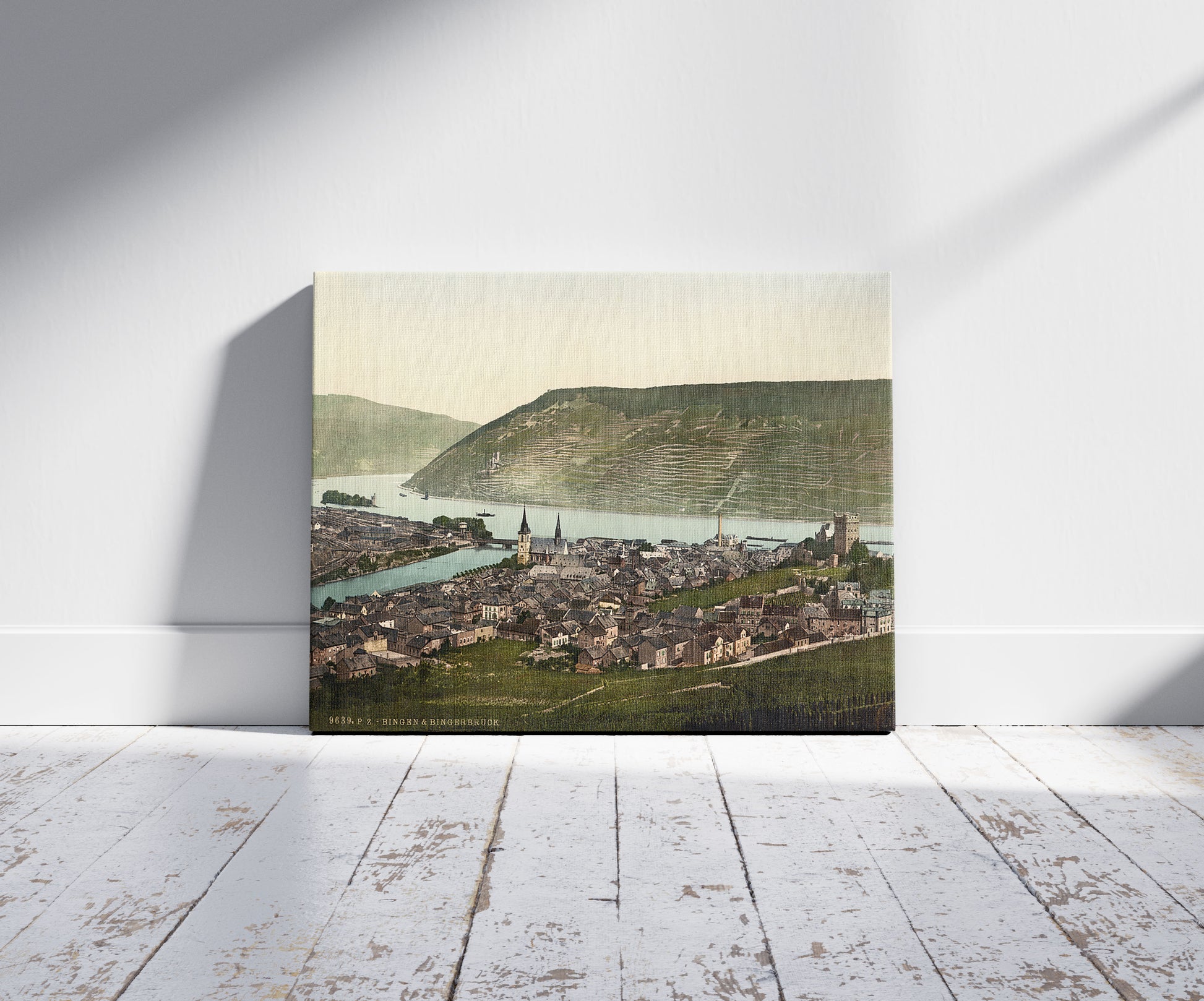 A picture of Bingen and the bridge, the Rhine, Germany, a mockup of the print leaning against a wall