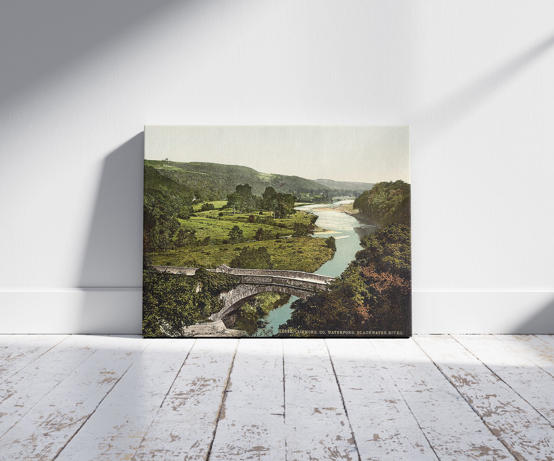 A picture of Blackwater River, Lismore. County Waterford, Ireland, a mockup of the print leaning against a wall