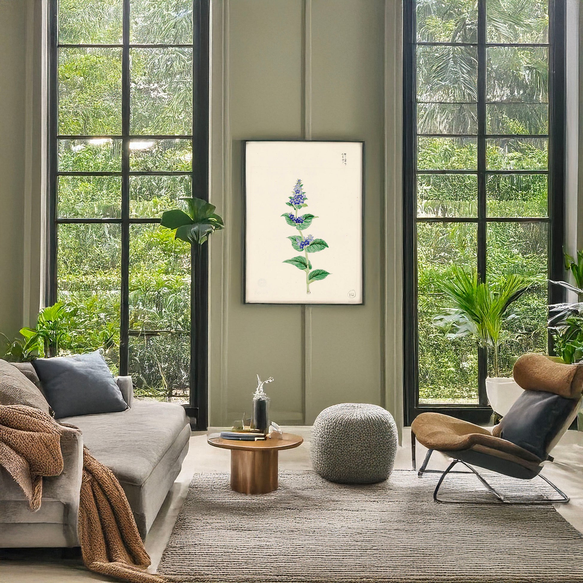 A picture of Blue blossoms on stalk with leaves, a mockup of the print leaning against a wall