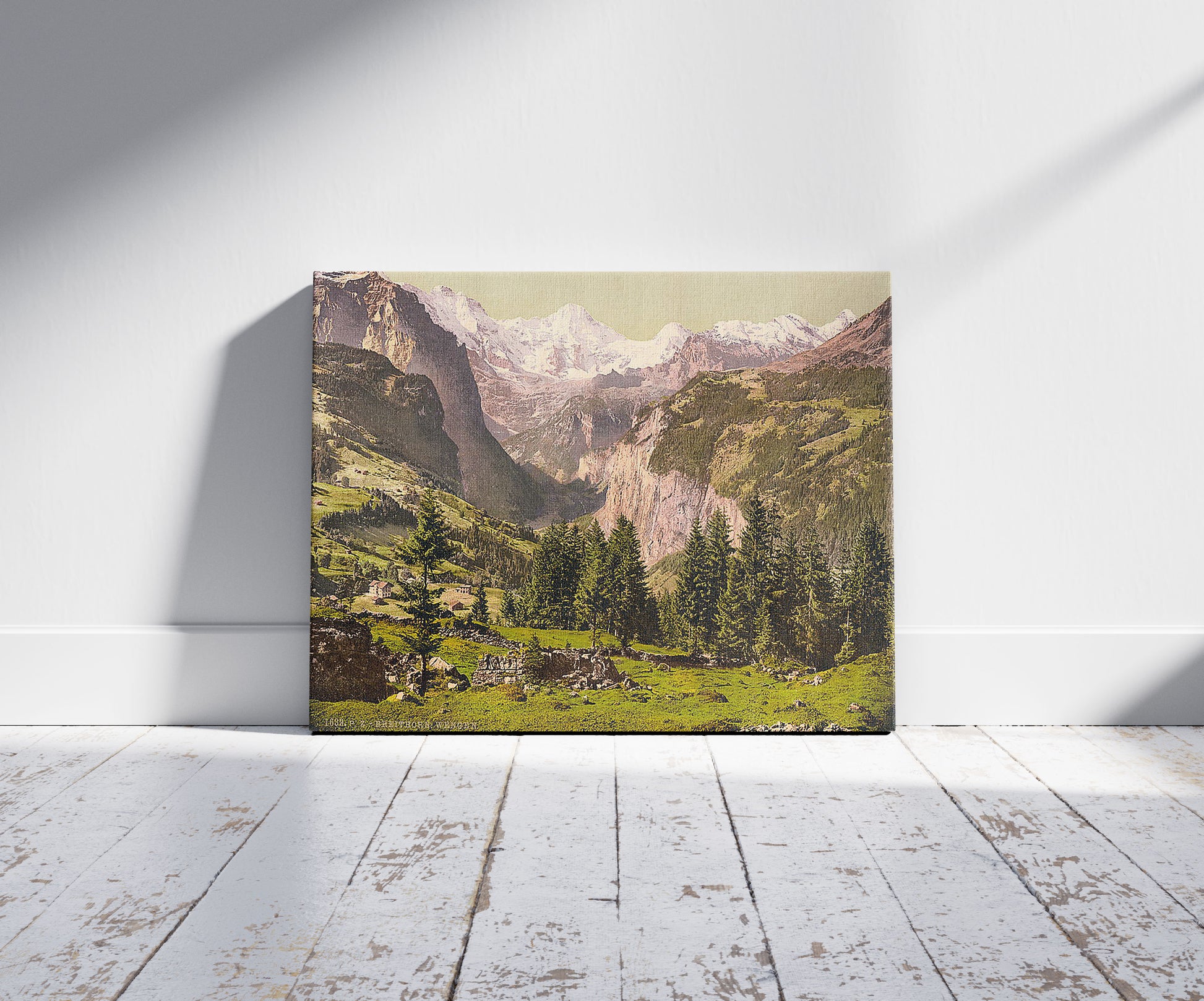 A picture of Breithorn from Wengen, Bernese Oberland, Switzerland, a mockup of the print leaning against a wall