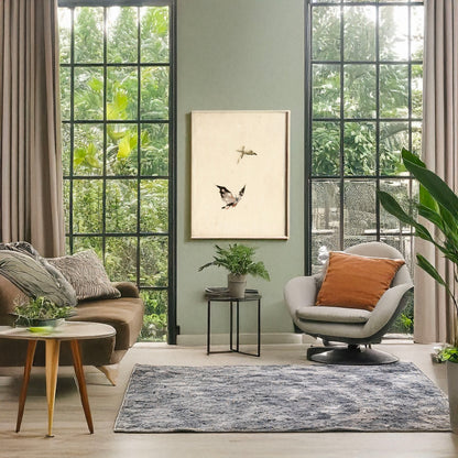 A picture of Butterfly and moth, a mockup of the print leaning against a wall