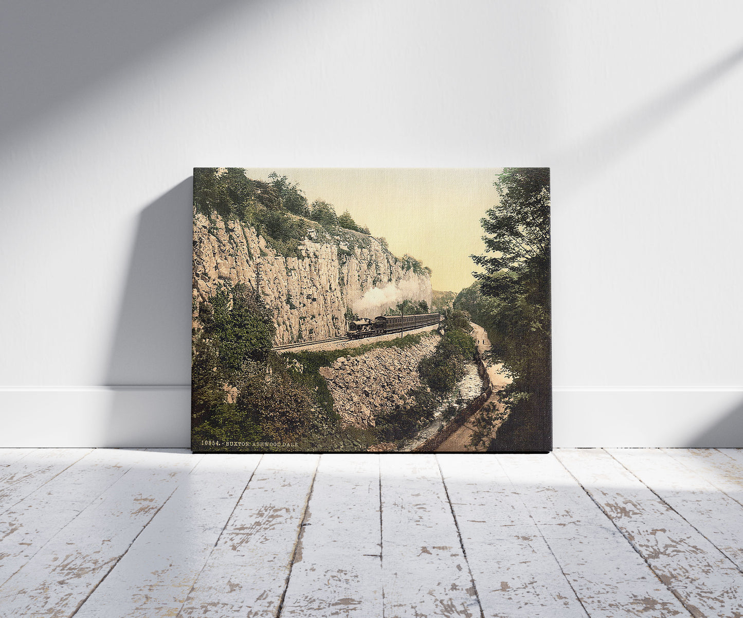 A picture of Buxton, Ashwood Dale, Derbyshire, England, a mockup of the print leaning against a wall