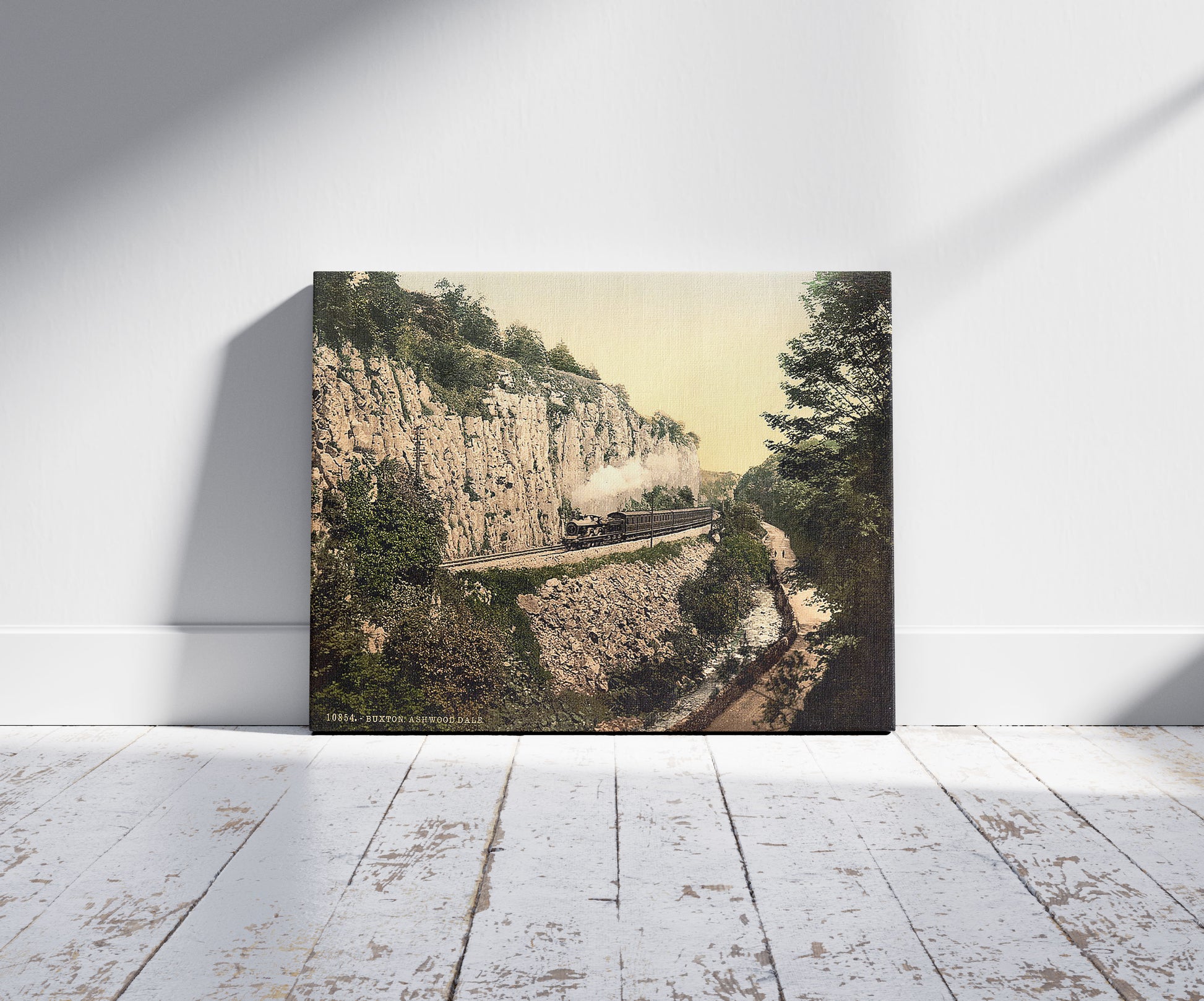 A picture of Buxton, Ashwood Dale, Derbyshire, England, a mockup of the print leaning against a wall