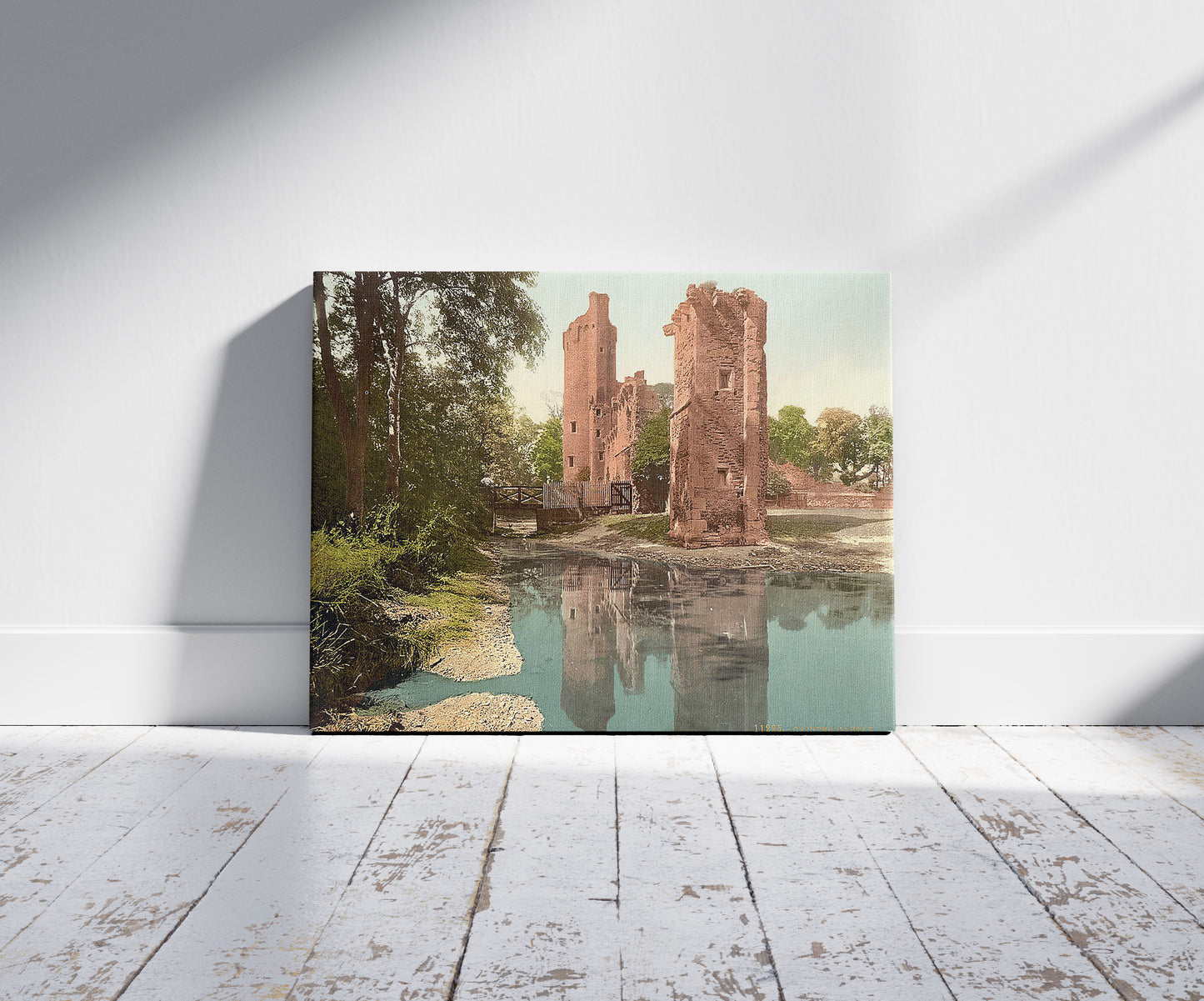 A picture of Caister Castle, Caister, i.e., Caister-on-Sea, England, a mockup of the print leaning against a wall