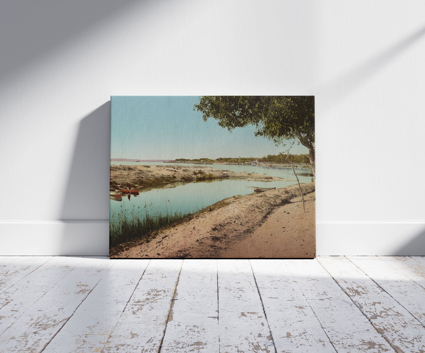 A picture of Canal de Suez, Ismailiya, a mockup of the print leaning against a wall