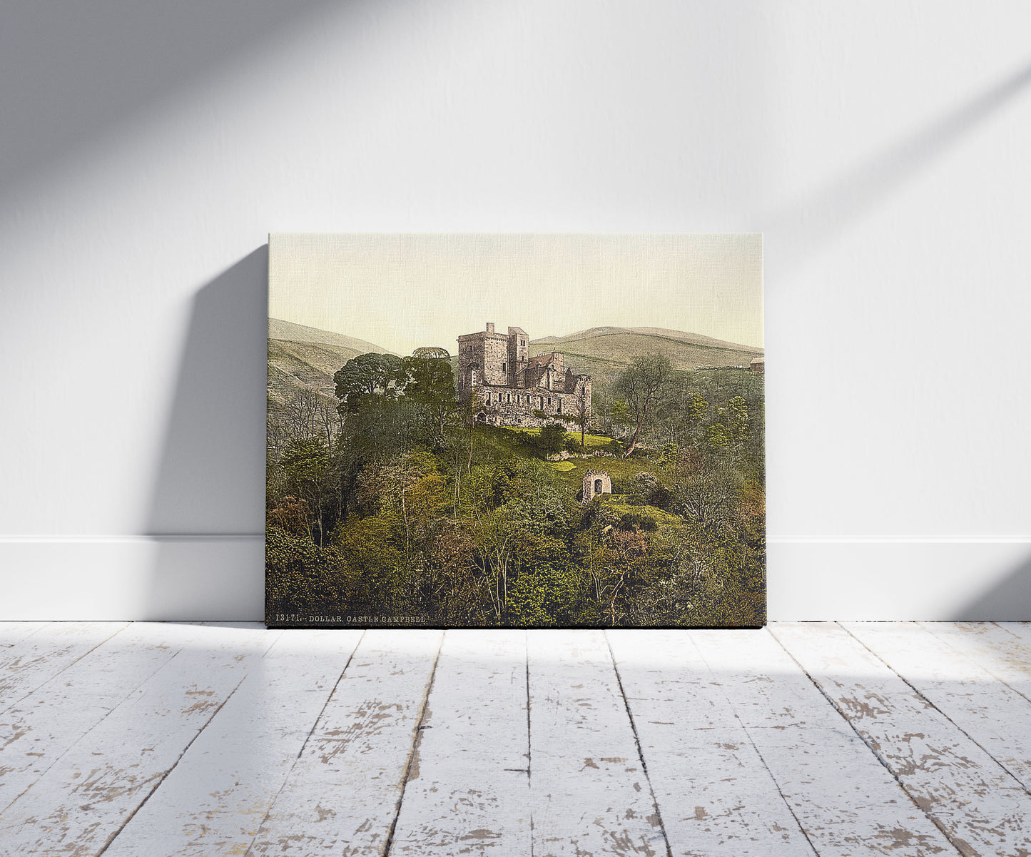 A picture of Castle Campbell, Dollar, Scotland, a mockup of the print leaning against a wall