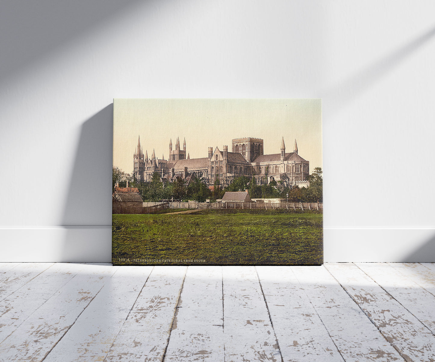 A picture of Cathedral, from south, Peterborough, England, a mockup of the print leaning against a wall