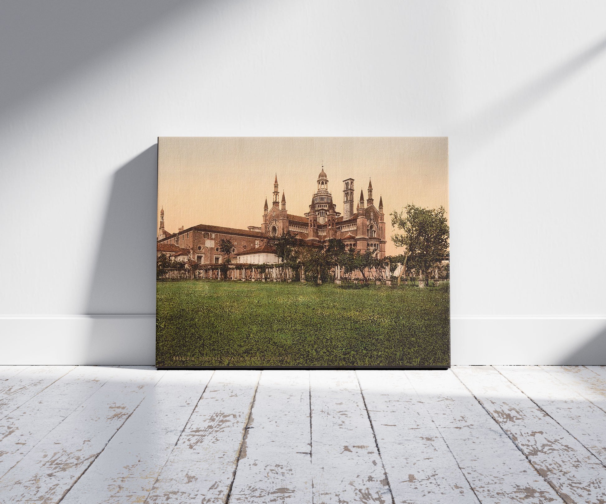 A picture of Certosa di Pavia, the back, Milan, Italy, a mockup of the print leaning against a wall