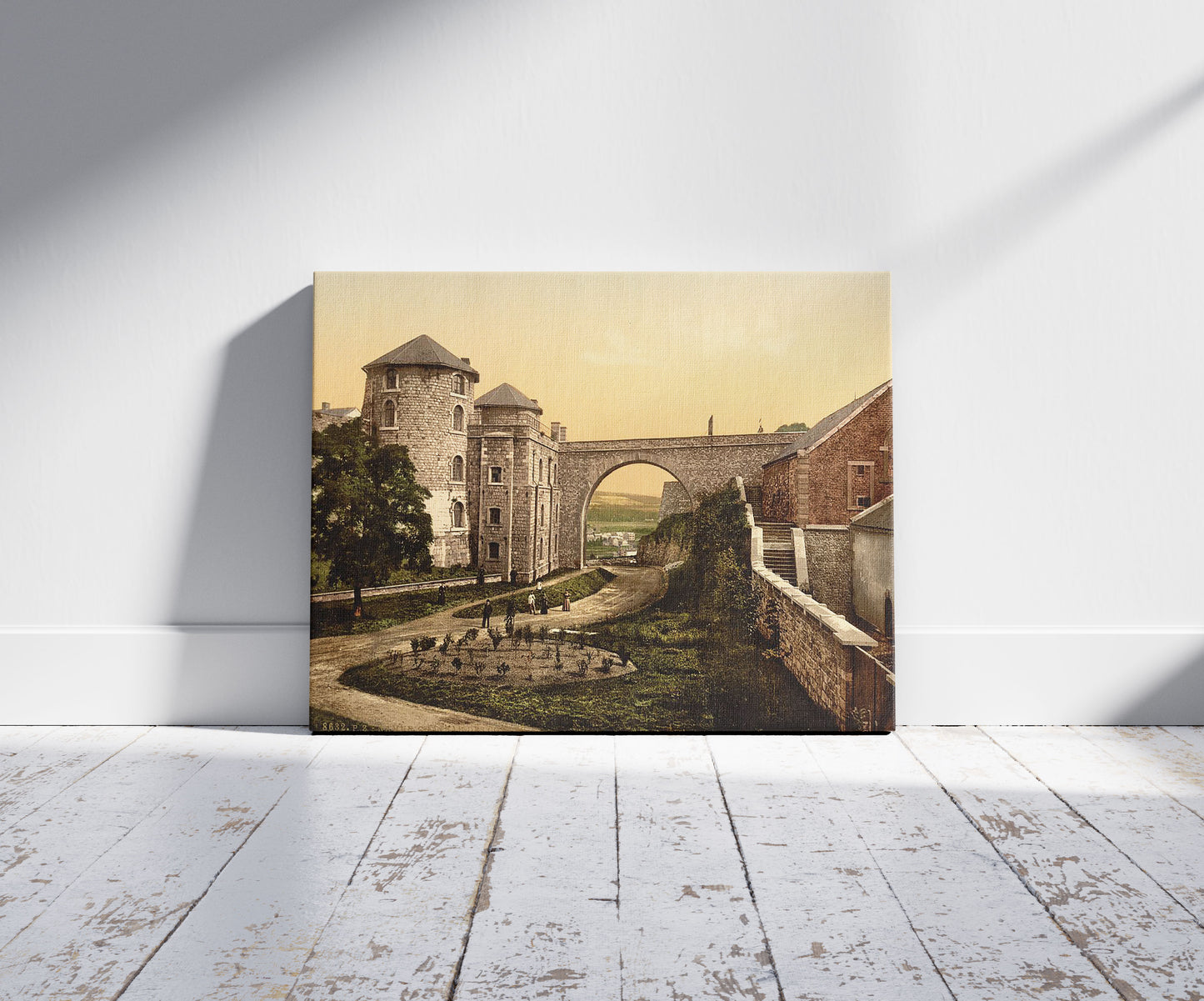 A picture of Chateau des Comtes, Namur, Belgium, a mockup of the print leaning against a wall