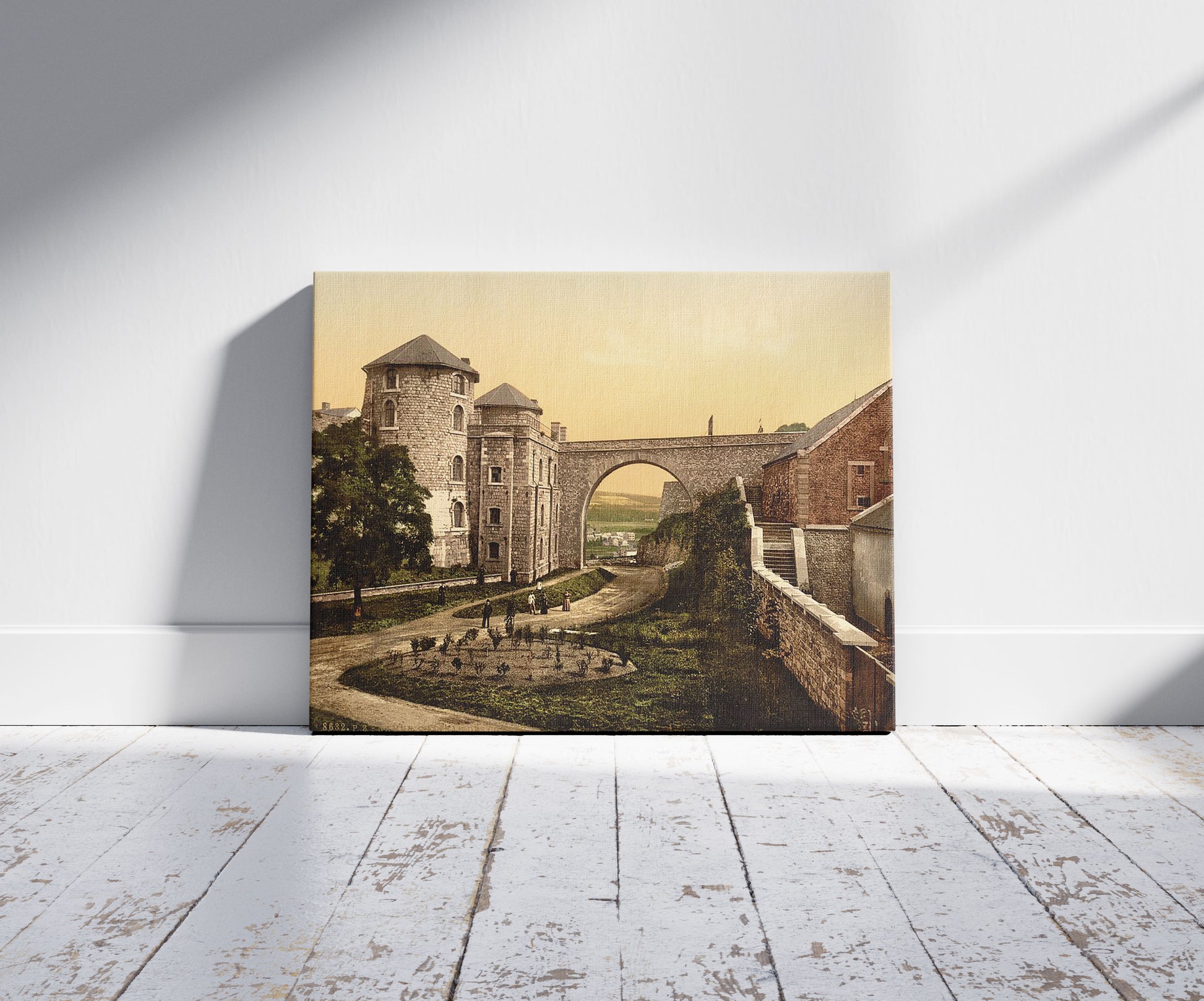 A picture of Chateau des Comtes, Namur, Belgium, a mockup of the print leaning against a wall