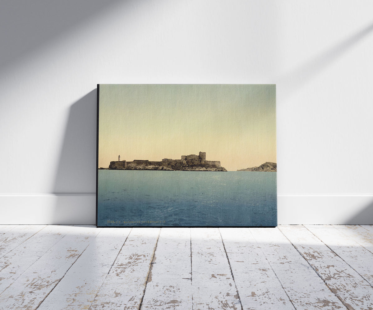 A picture of Chateau d'If, from the sea, Marseilles, France, a mockup of the print leaning against a wall