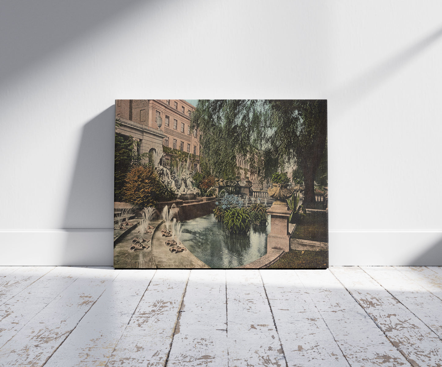 A picture of Cheltenham. Promenade Fountain, a mockup of the print leaning against a wall