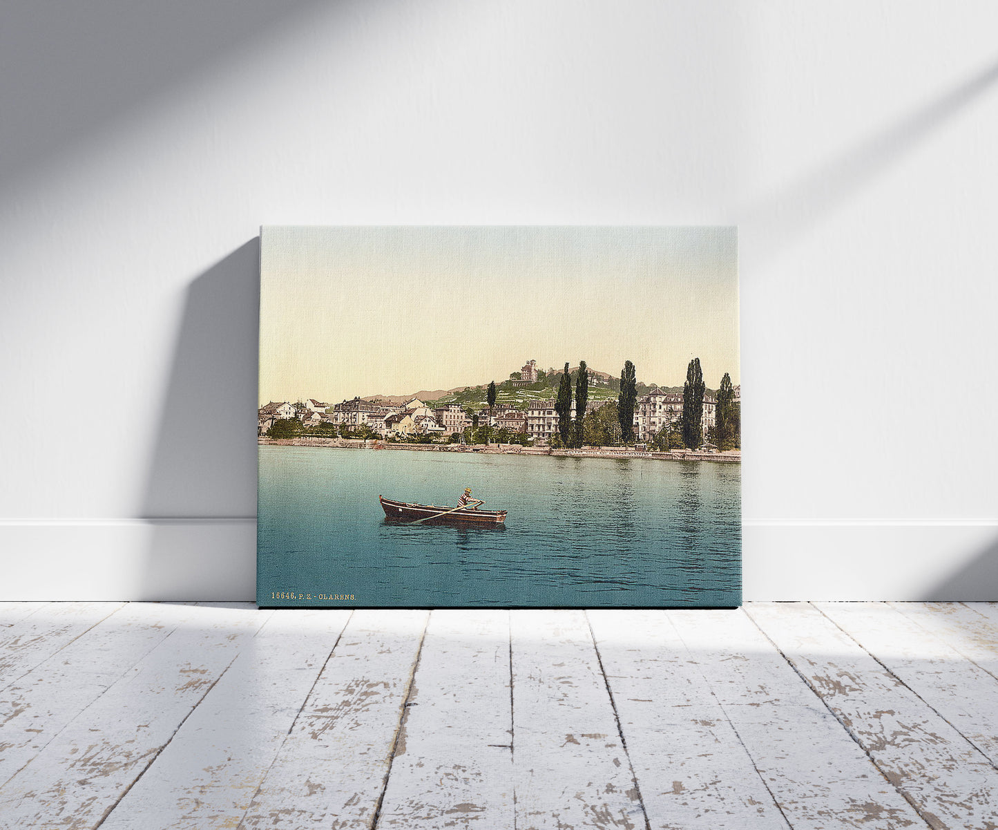 A picture of Clarens, general view, from the Lake, Geneva Lake, Switzerland, a mockup of the print leaning against a wall