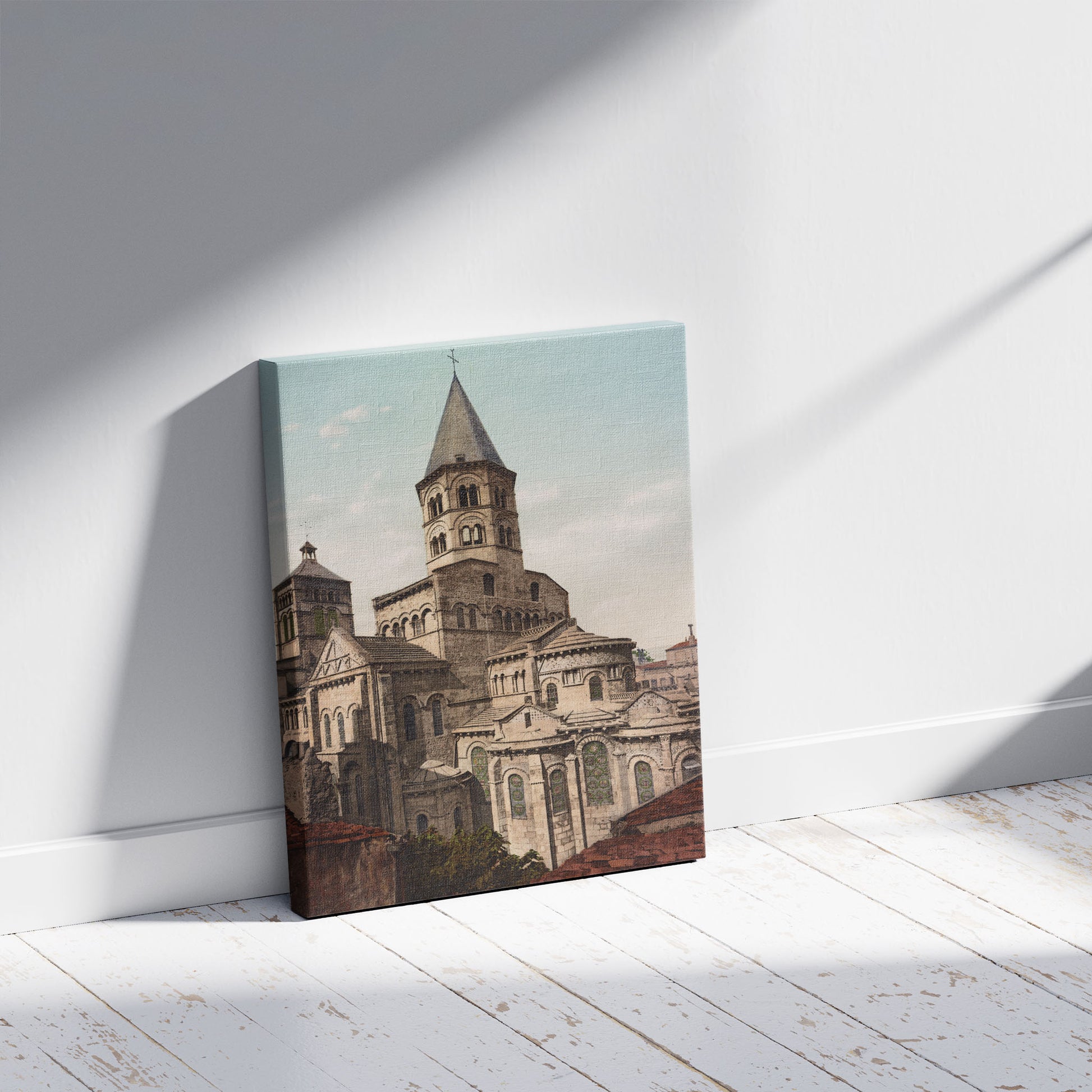 A picture of Clermont-Ferrand. Basilique de N.D. du Port, a mockup of the print leaning against a wall