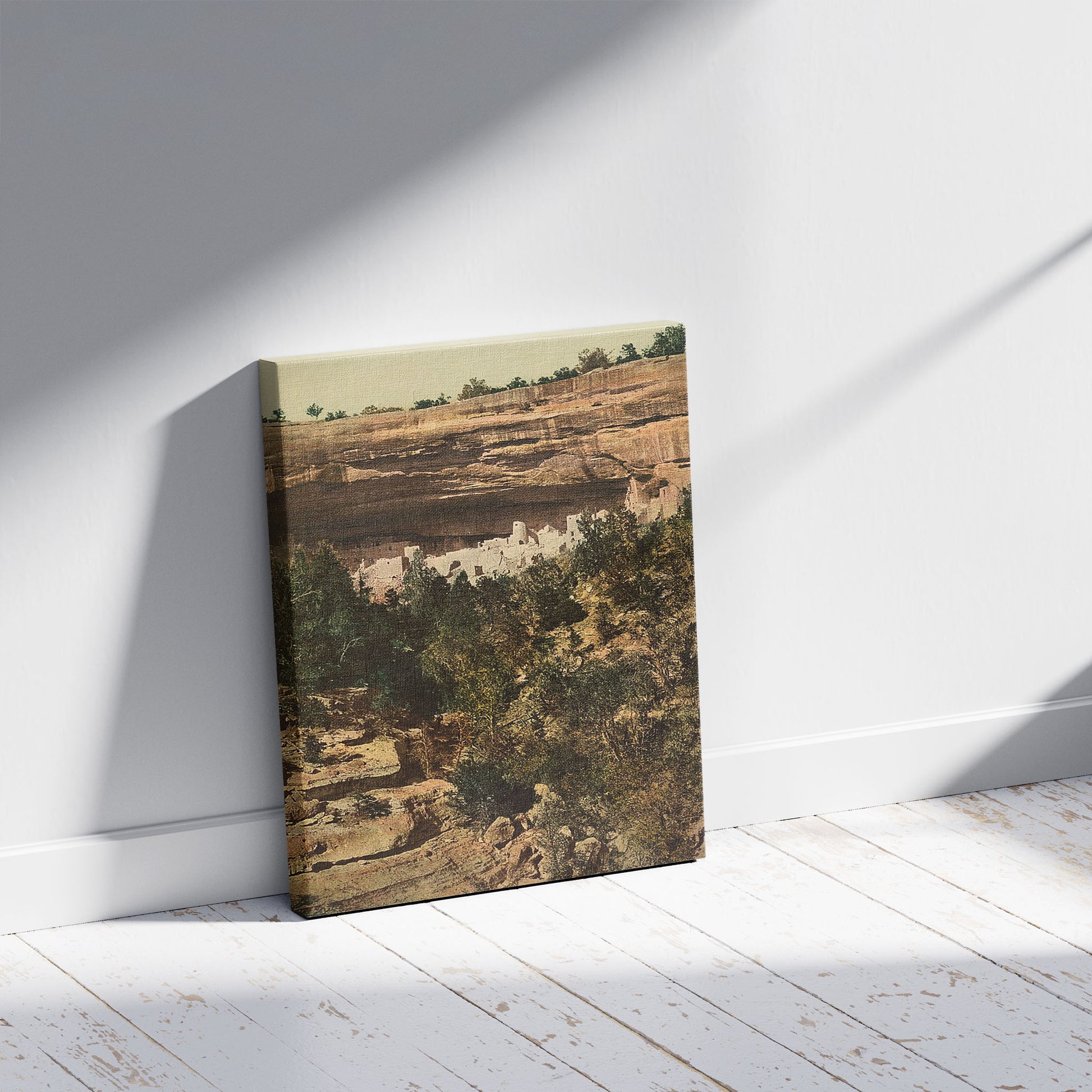 A picture of Cliff Palace, Mesa Verde, general view, a mockup of the print leaning against a wall