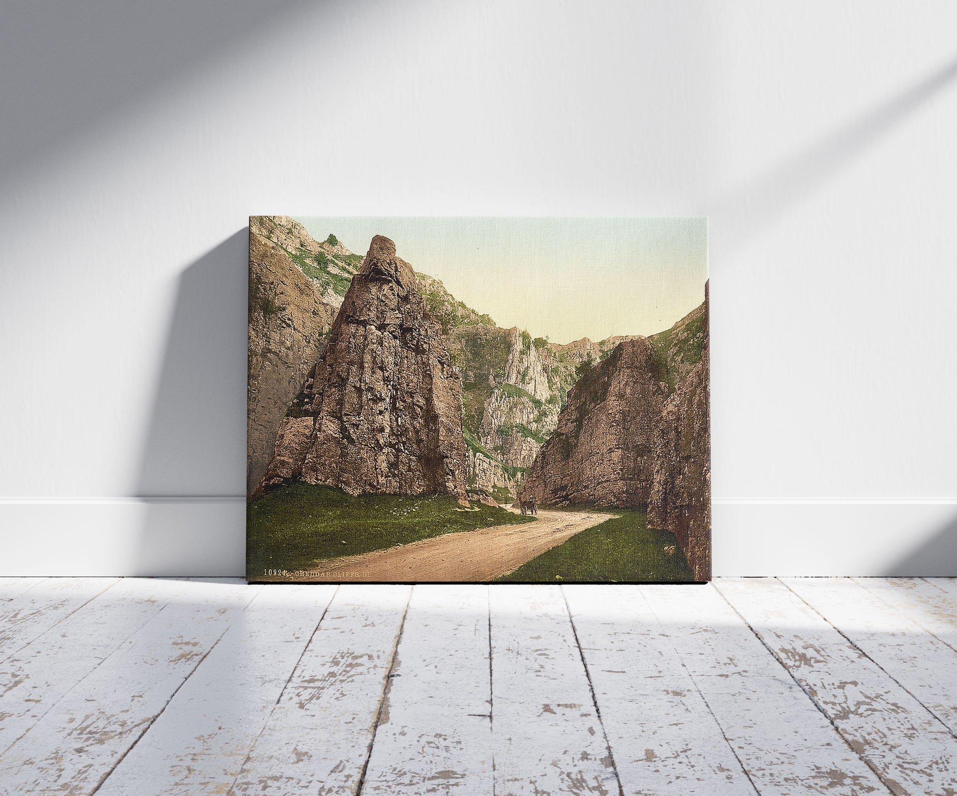 A picture of Cliffs, III, Cheddar, England, a mockup of the print leaning against a wall