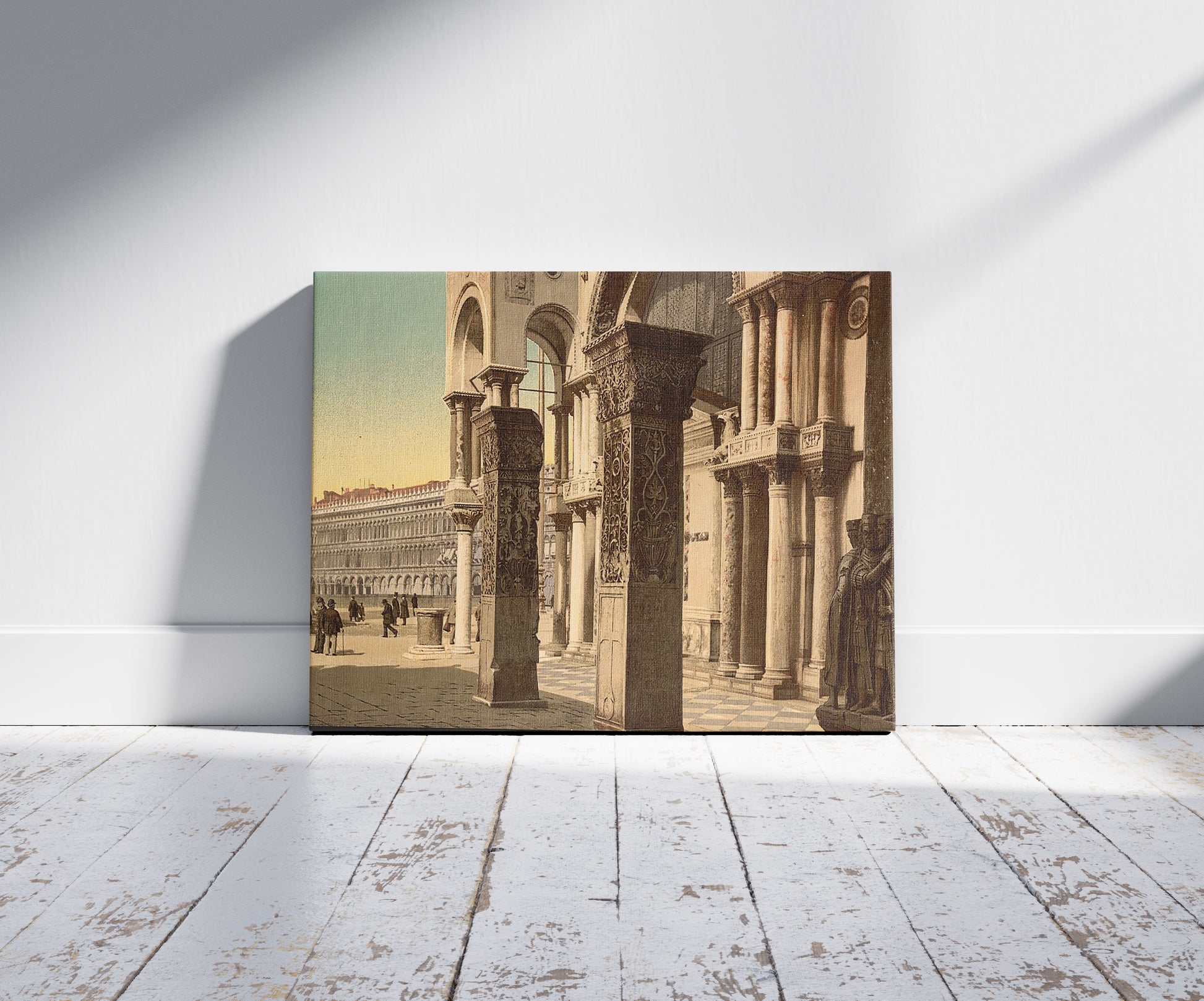 A picture of Columns of St. Mark's Church, Venice, Italy, a mockup of the print leaning against a wall