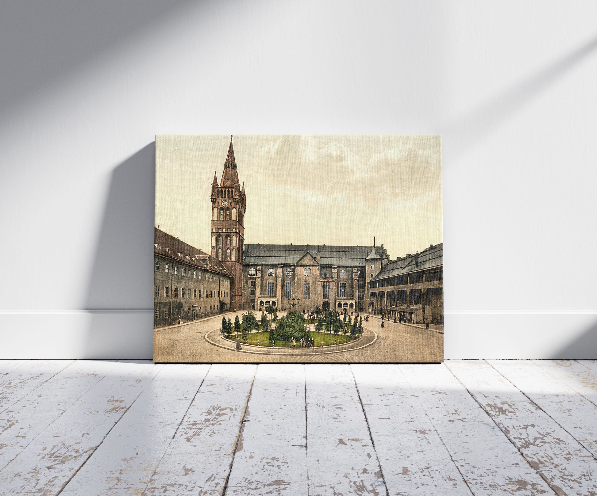 A picture of Court and church of the castle and the criminal tribunal, Konigsberg, East Prussia, Germany (i.e., Kaliningrad, Kaliningradskai︠a︡ oblastʹ, Russia), a mockup of the print leaning against a wall