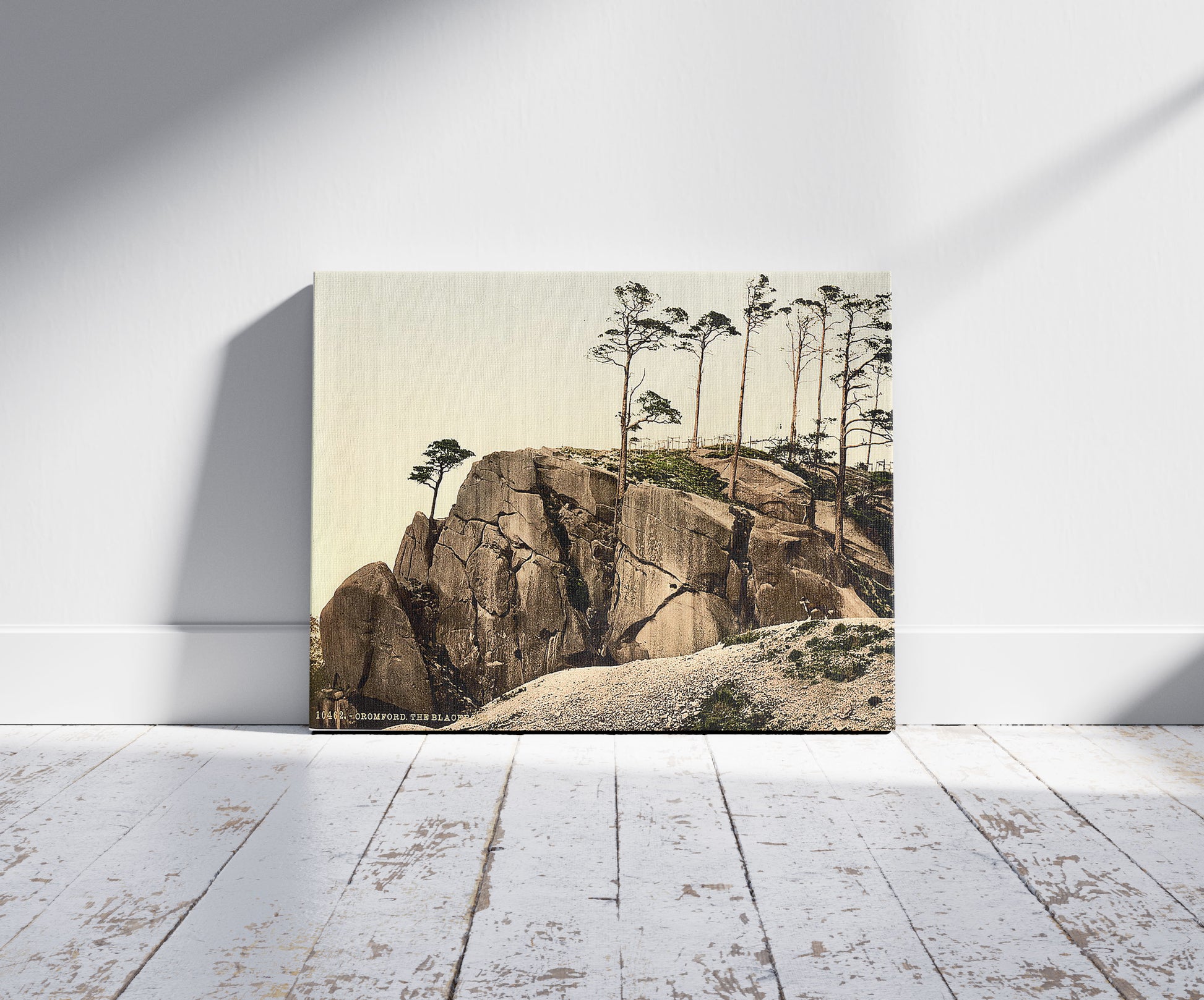 A picture of Cromford, the Black Rocks, Derbyshire, England, a mockup of the print leaning against a wall