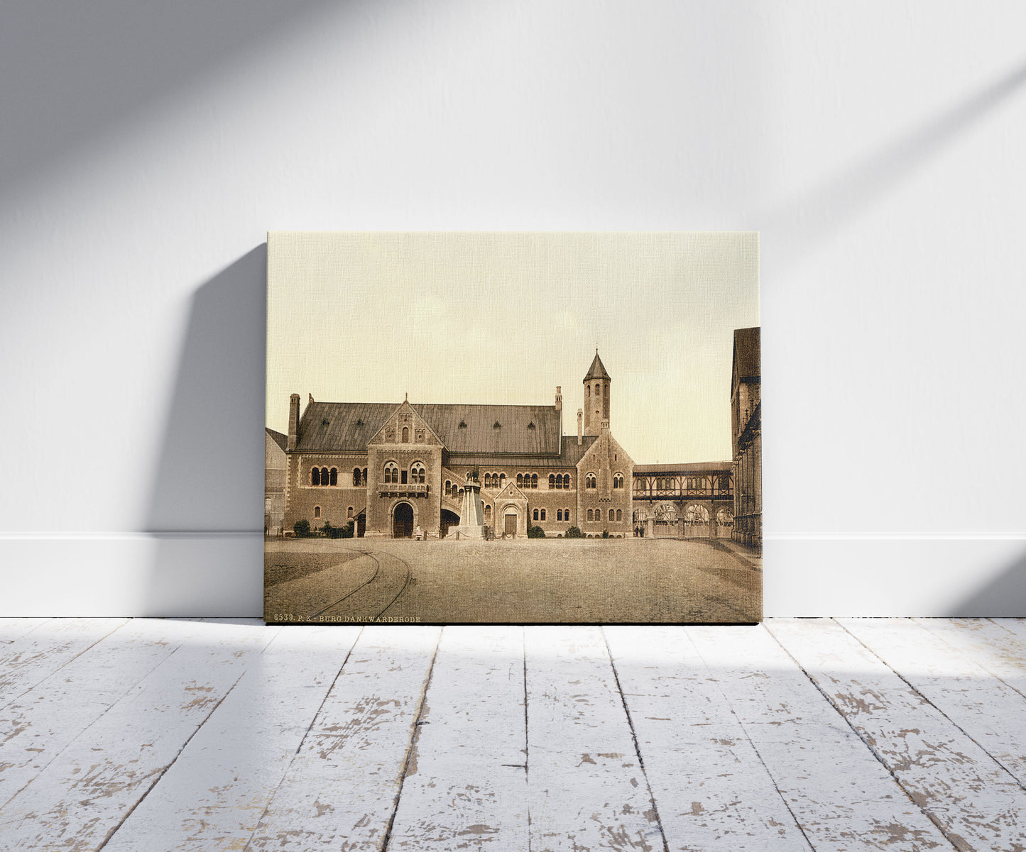 A picture of Dankwarderode Castle, Germany, a mockup of the print leaning against a wall