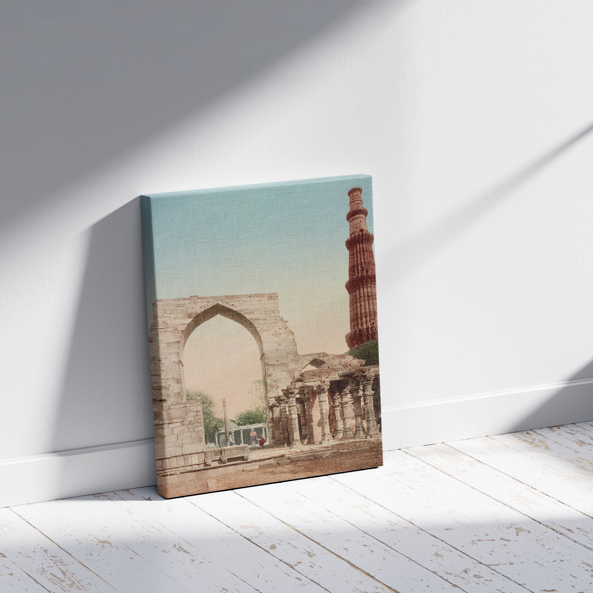 A picture of Delhi. Kutub Minar, a mockup of the print leaning against a wall