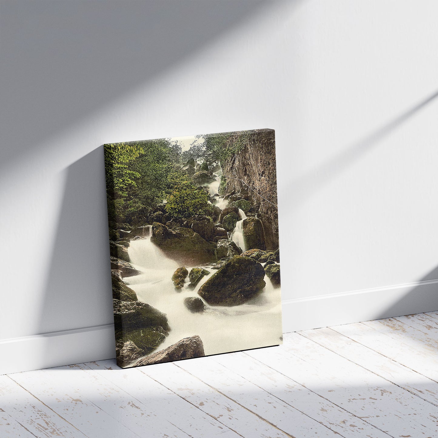 A picture of Derwentwater, Lodore Falls, Lake District, England, a mockup of the print leaning against a wall