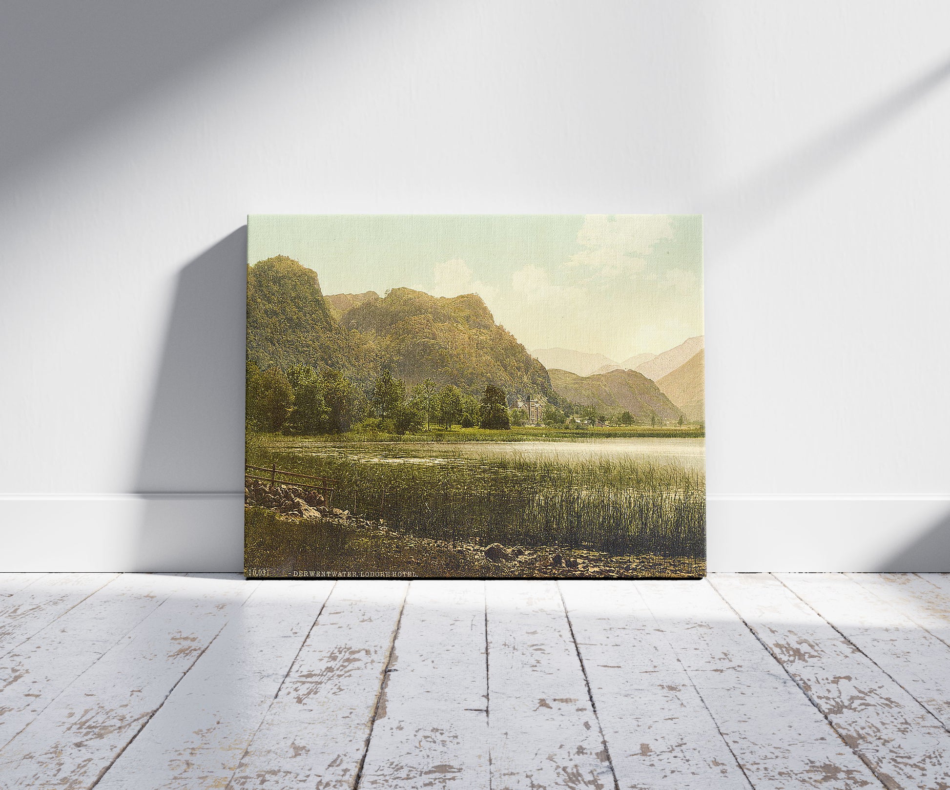 A picture of Derwentwater, Lodore Hotel, Waterlily Bay, Lake District, England, a mockup of the print leaning against a wall