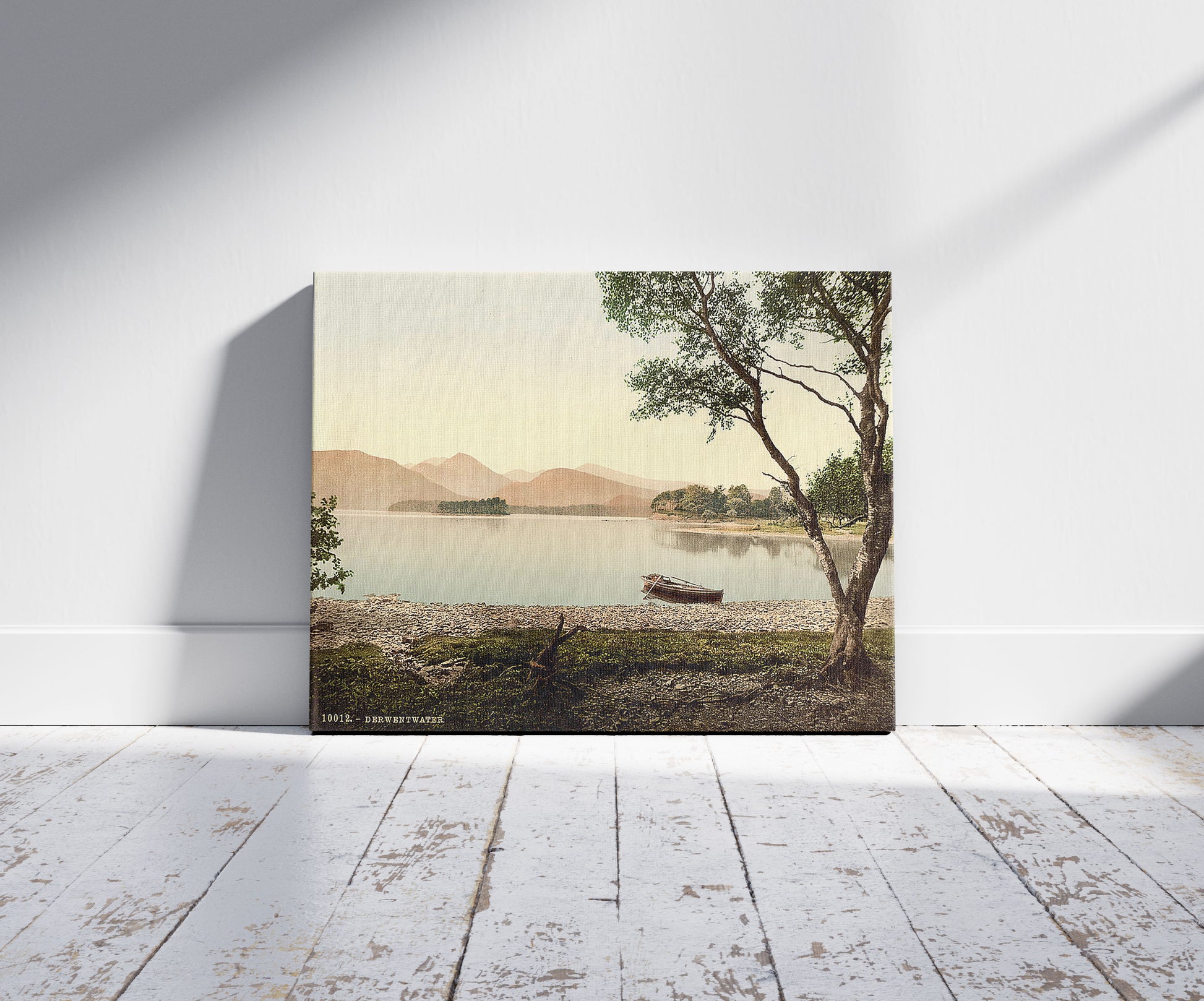 A picture of Derwentwater, Scarfclose Bay, Lake District, England, a mockup of the print leaning against a wall