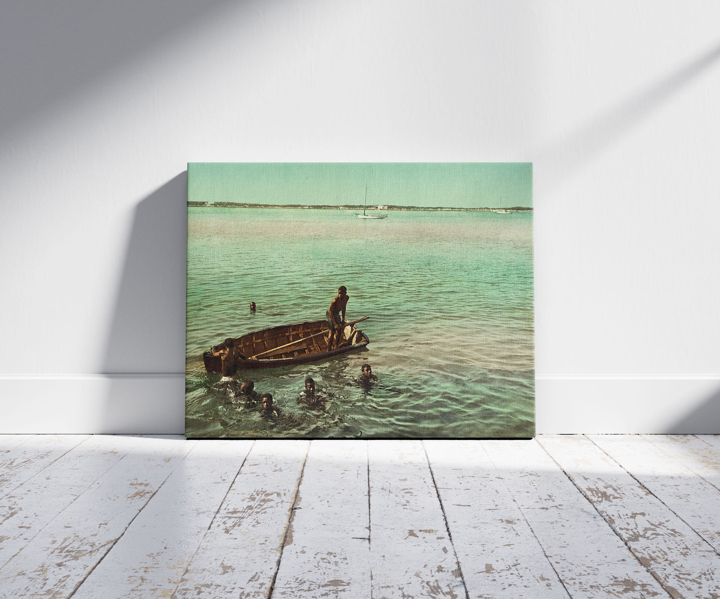 A picture of Diving for coins, Nassau, Bahama Isl'ds, a mockup of the print leaning against a wall