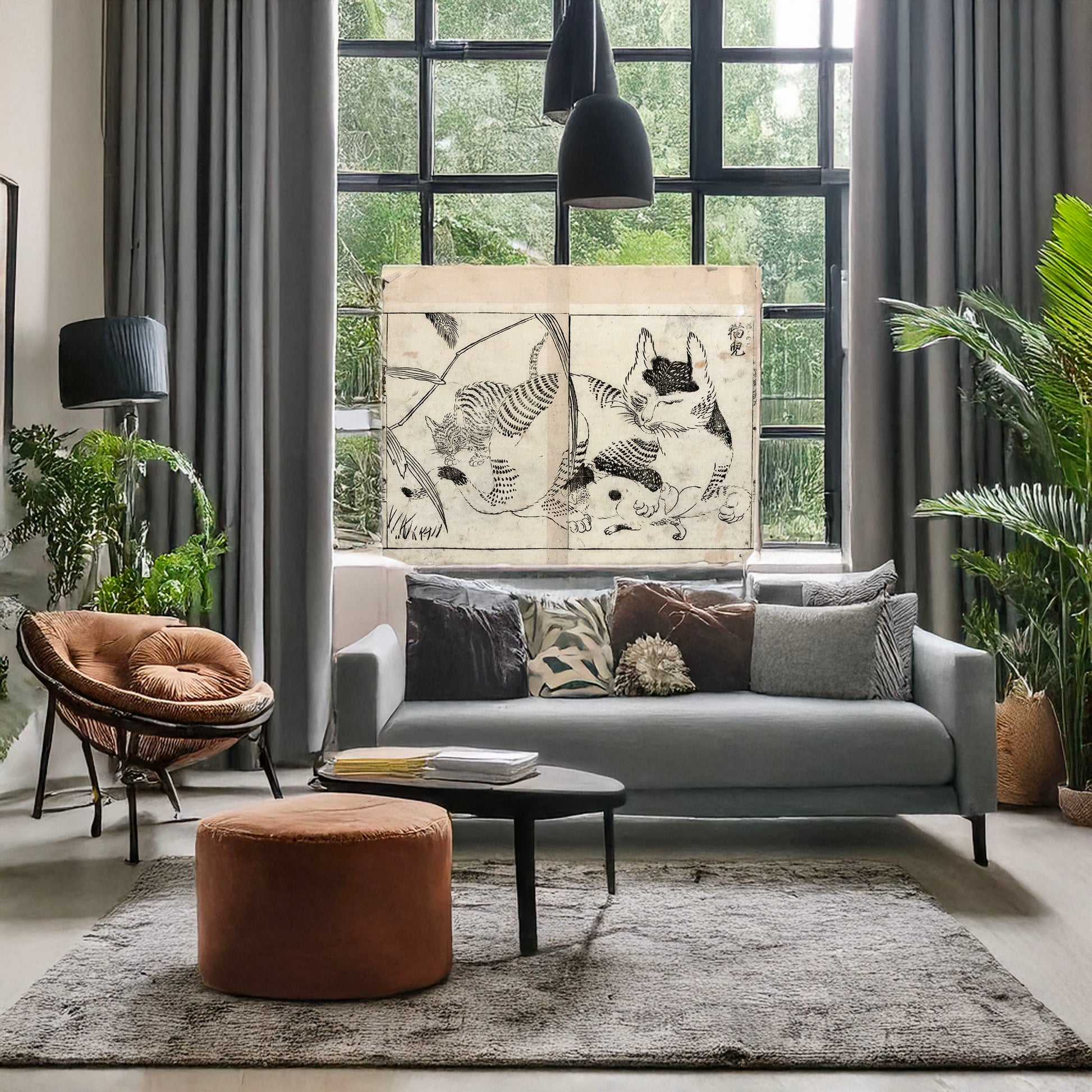 A picture of Domestic cat nursing kittens, a mockup of the print leaning against a wall