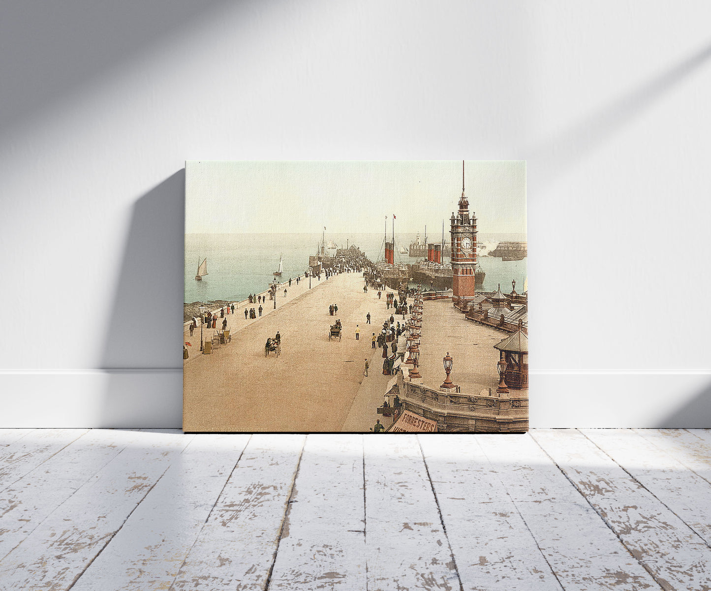 A picture of Douglas Pier, Isle of Man, a mockup of the print leaning against a wall