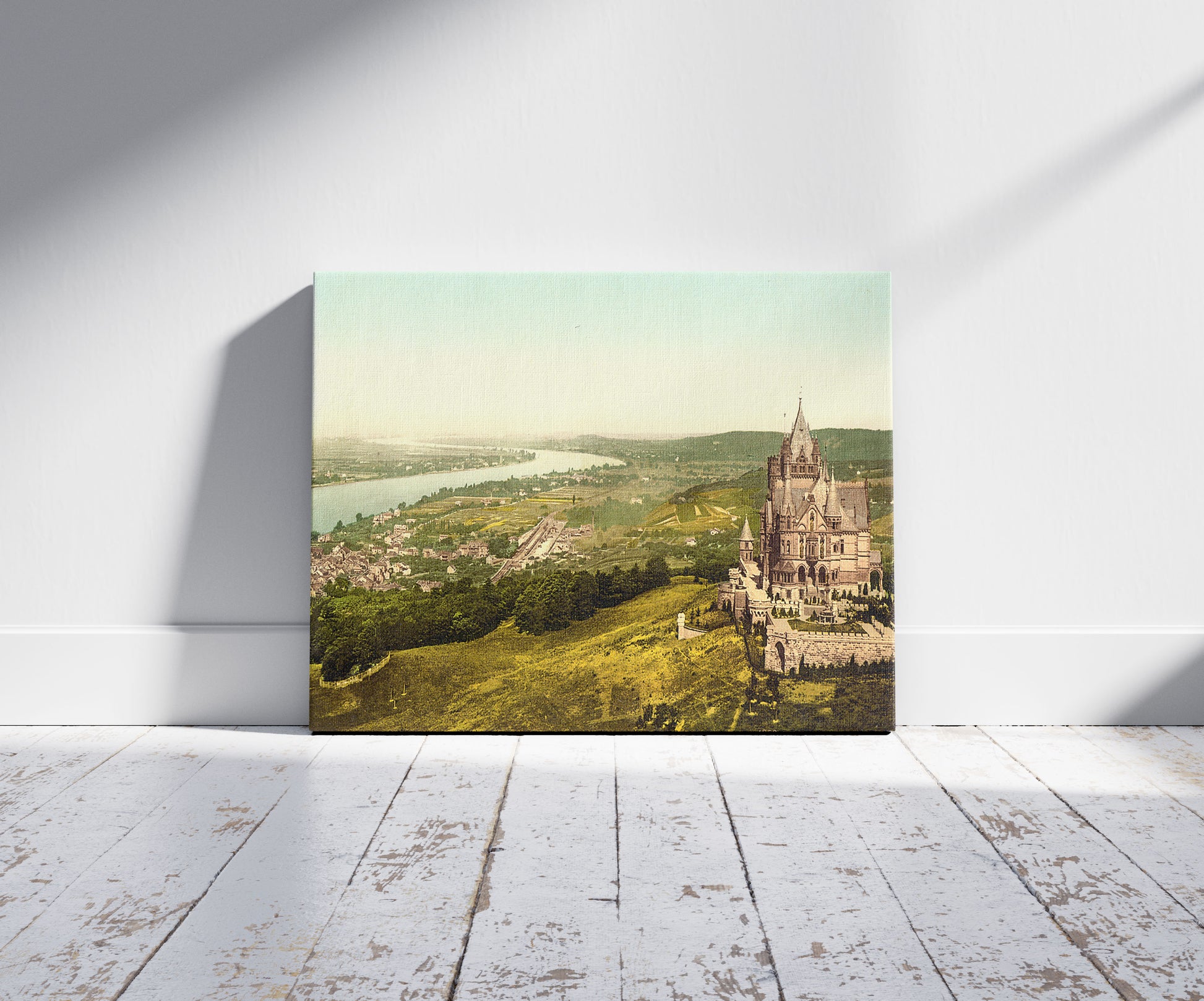A picture of Drachenburg and Konigswinter, the Rhine, Germany, a mockup of the print leaning against a wall