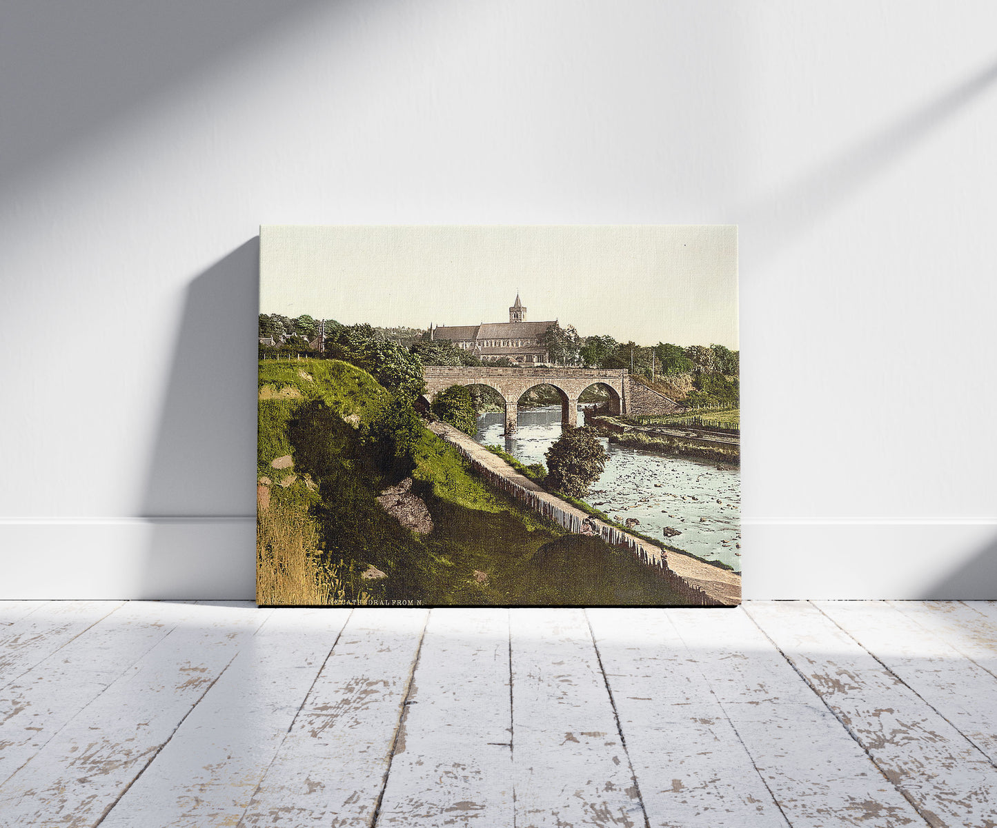 A picture of Dunblane Cathedral from N. (i.e., North), Scotland, a mockup of the print leaning against a wall