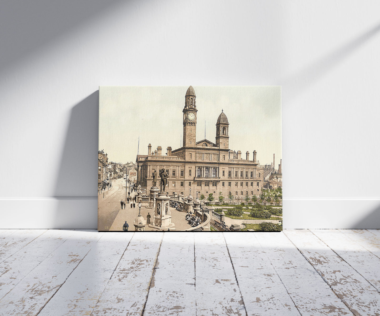 A picture of Dunn Square, Paisley, Scotland, a mockup of the print leaning against a wall