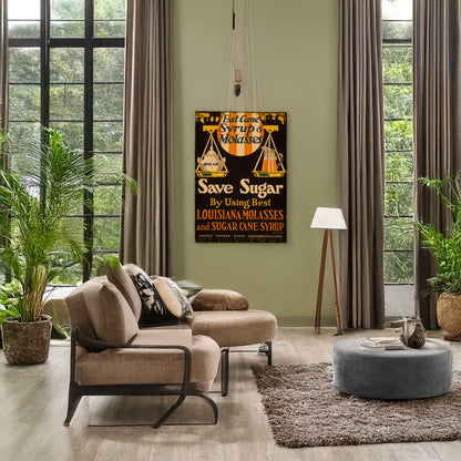 A picture of Eat cane syrup & molasses, save sugar by using best Louisiana molasses and sugar cane syrup, a mockup of the print leaning against a wall