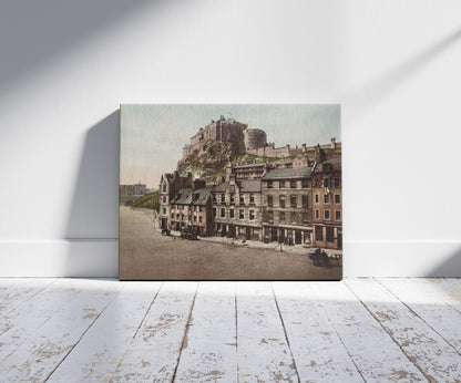 A picture of Edinburgh Castle, from Grassmarket, a mockup of the print leaning against a wall