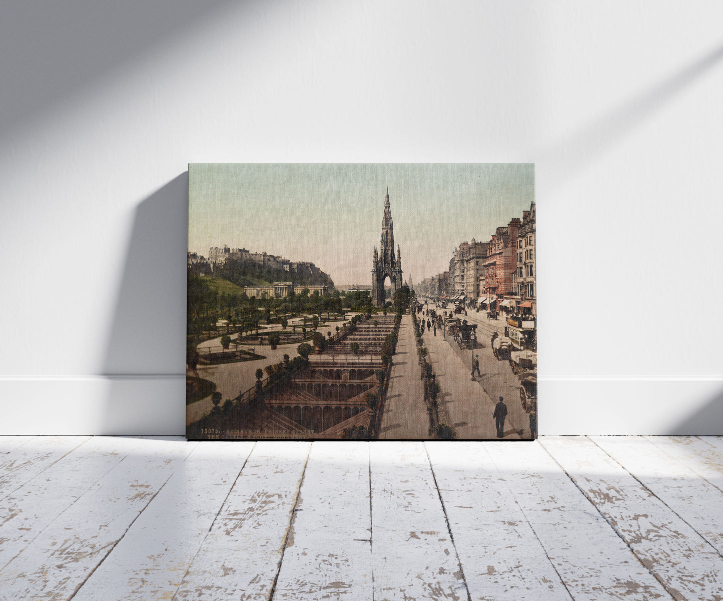 A picture of Edinburgh. Princess i.e. Princes Street. The Castle & Scott Monument