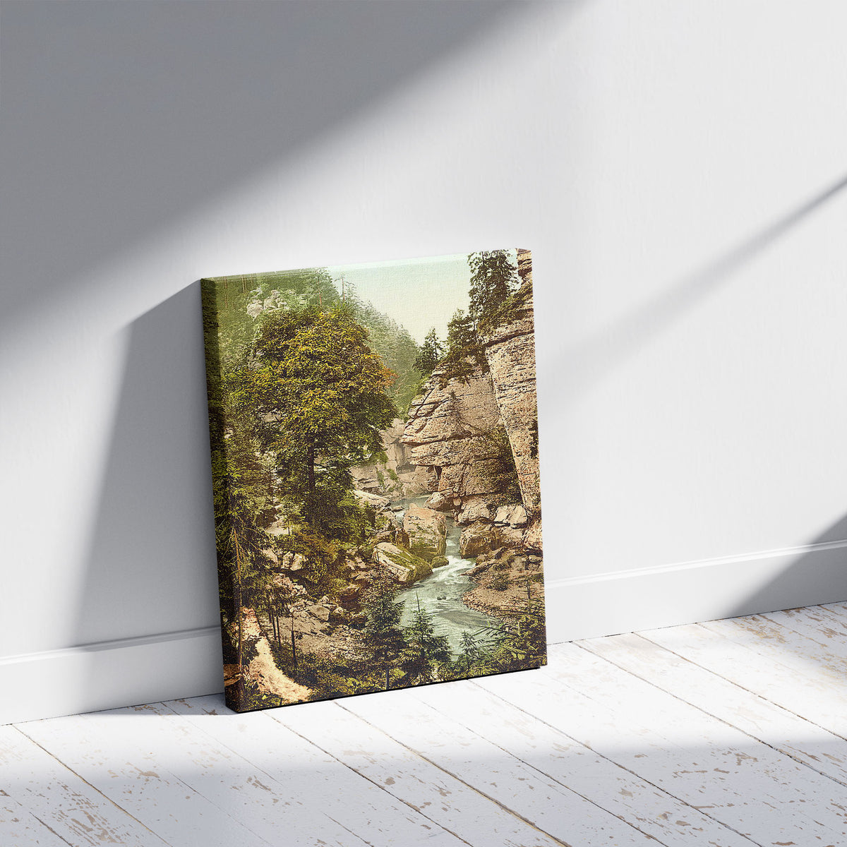 A picture of Edmunds Klamm, boat station, Bohemian Switzerland, Bohemia, Austro-Hungary, a mockup of the print leaning against a wall