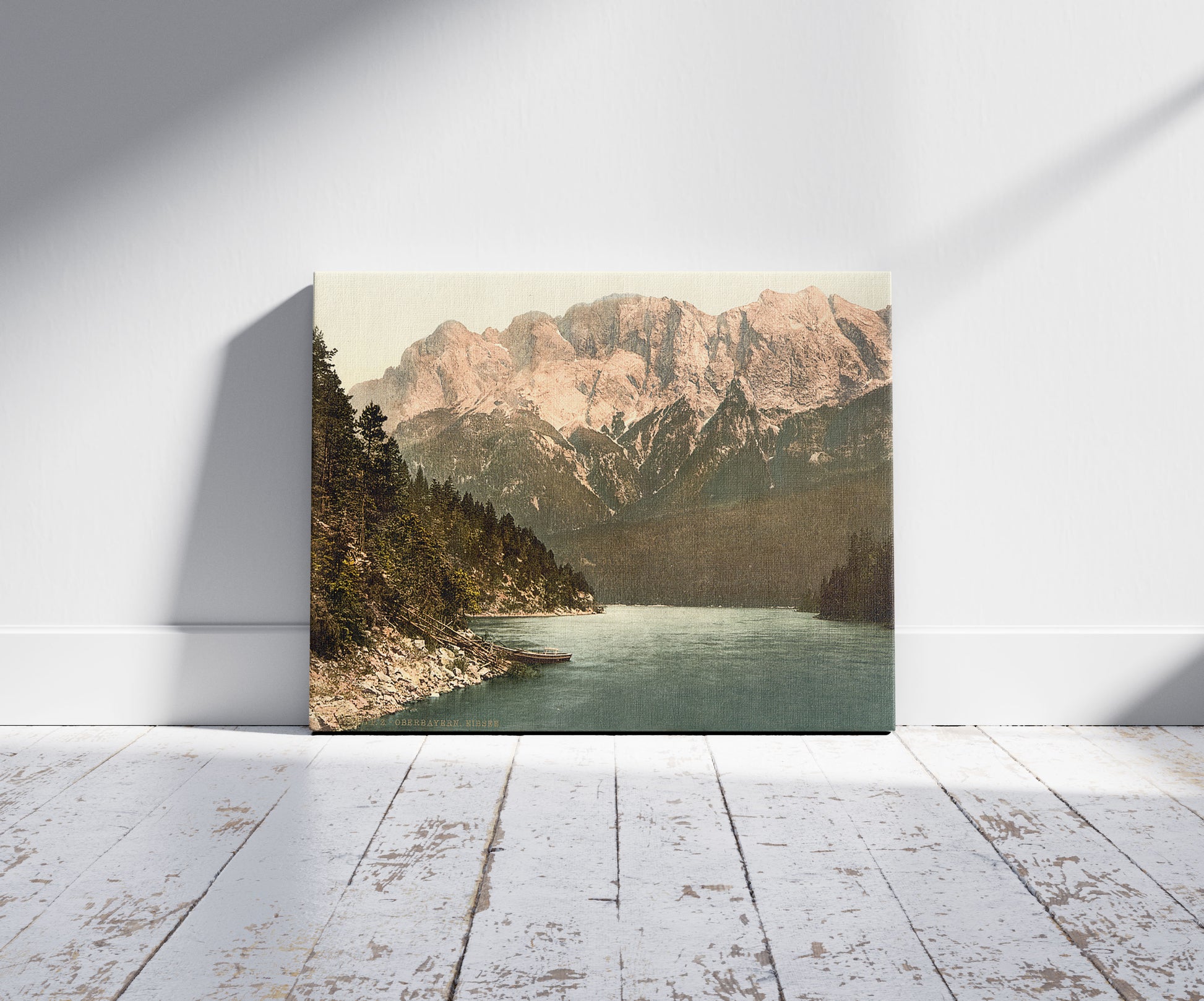 A picture of Eibsee, general view, Upper Bavaria, Germany, a mockup of the print leaning against a wall