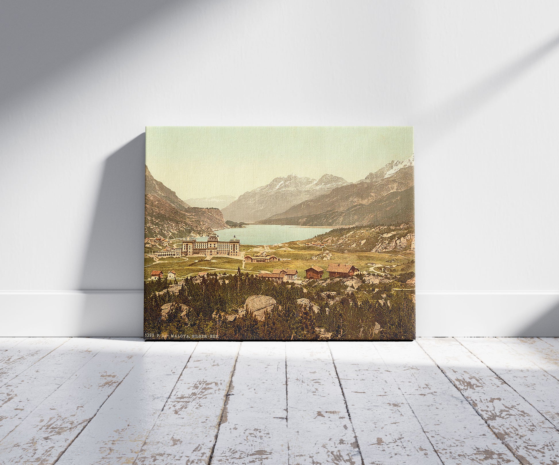 A picture of Engadine, Maloja, Lake of Sils, Grisons, Switzerland, a mockup of the print leaning against a wall