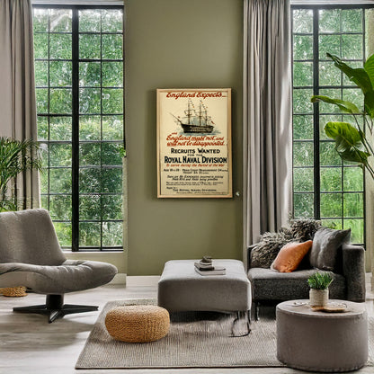 A picture of England expects - and England must not and will not be disappointed. Recruits wanted for the Royal Naval Division ..., a mockup of the print leaning against a wall