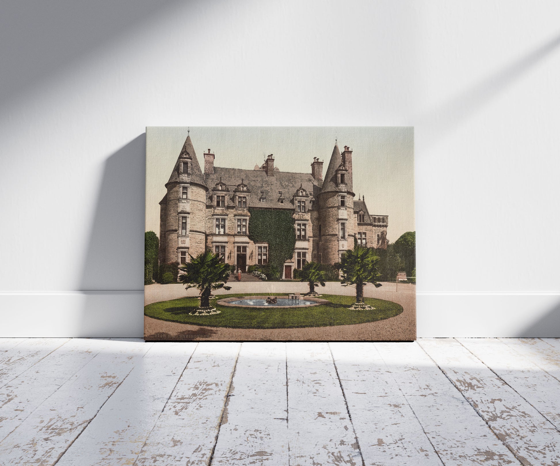 A picture of Environs de Cherbourg. Château de Tourlaville, a mockup of the print leaning against a wall
