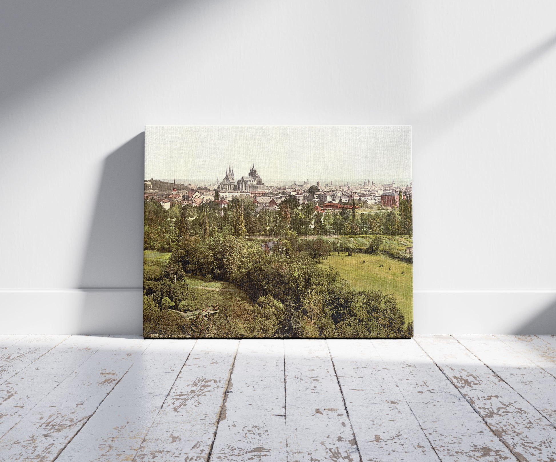 A picture of Erfurt, Thuringia, Germany, a mockup of the print leaning against a wall