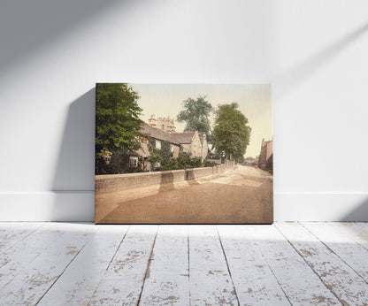 A picture of Eyam Plague Cottages, Derbyshire, England, a mockup of the print leaning against a wall