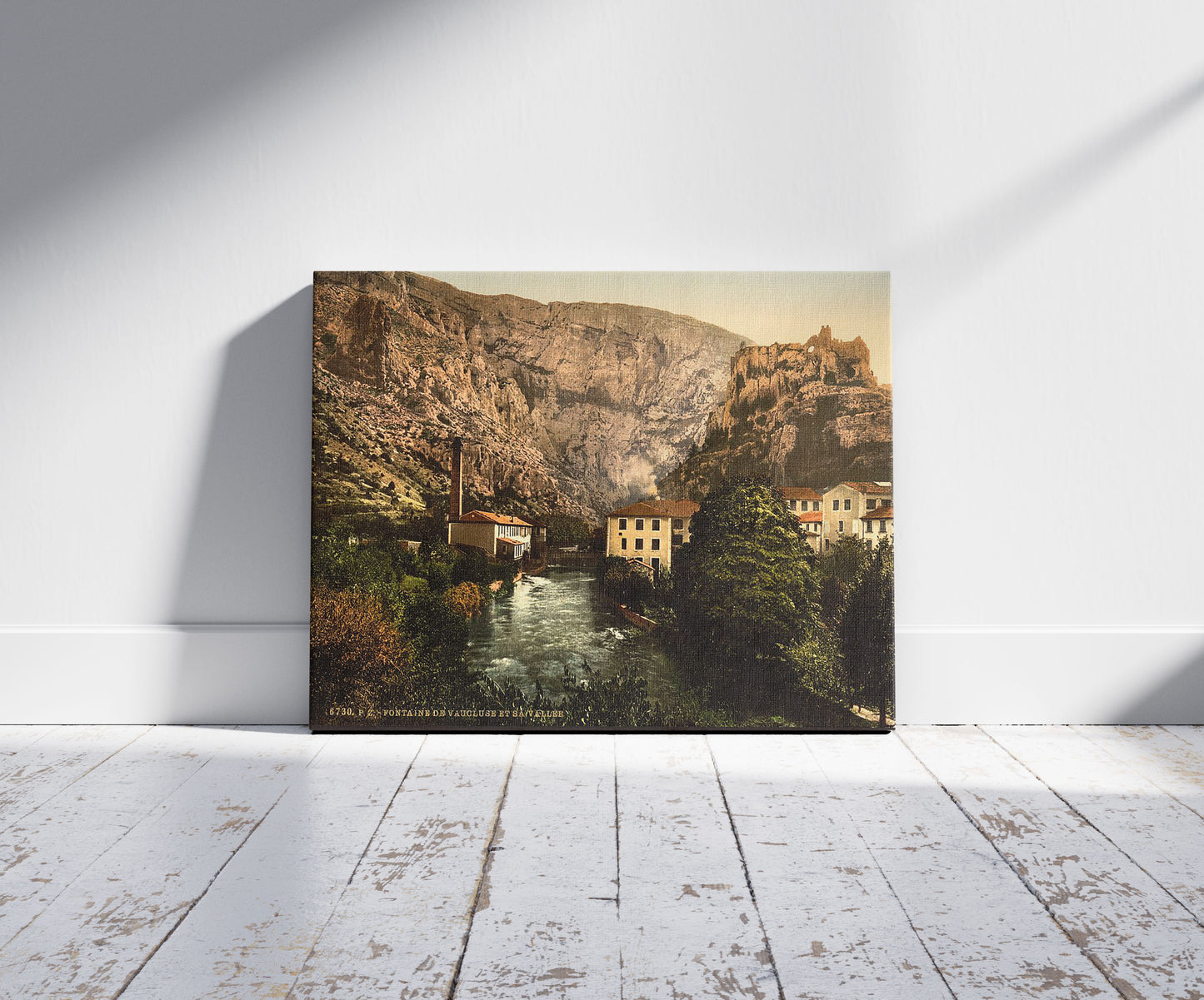 A picture of Fountain and valley of Vauclause, Orange, Provence, France, a mockup of the print leaning against a wall