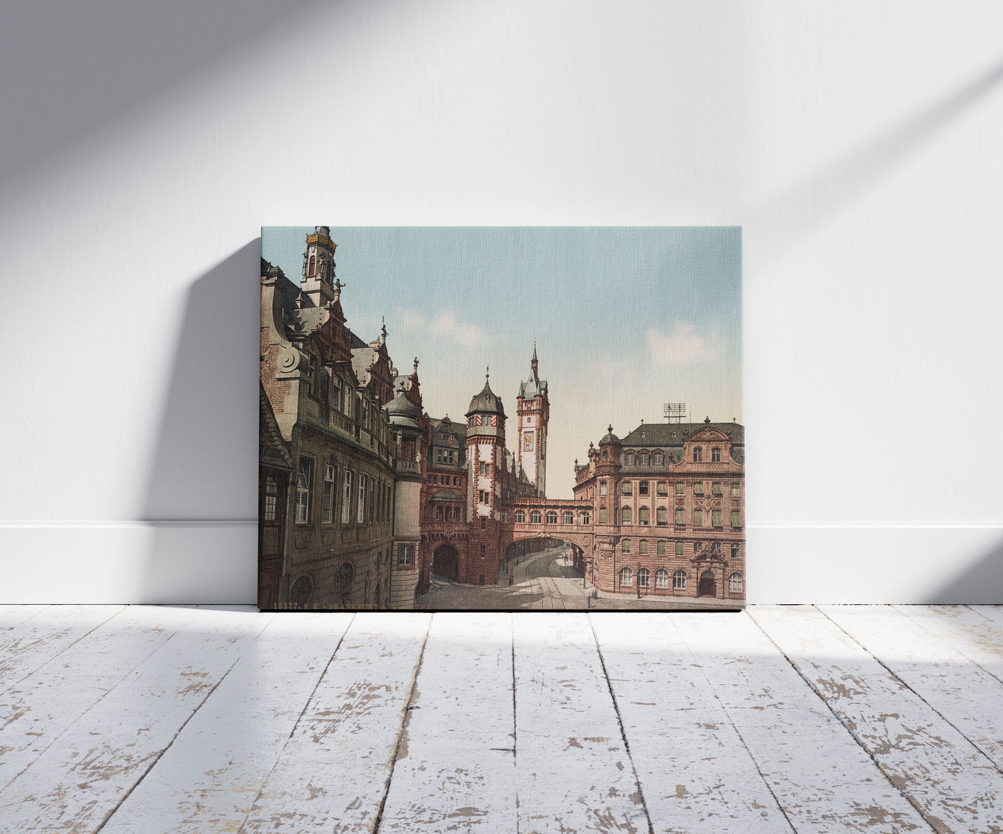 A picture of Frankfurt. A.M. Rathaus, a mockup of the print leaning against a wall