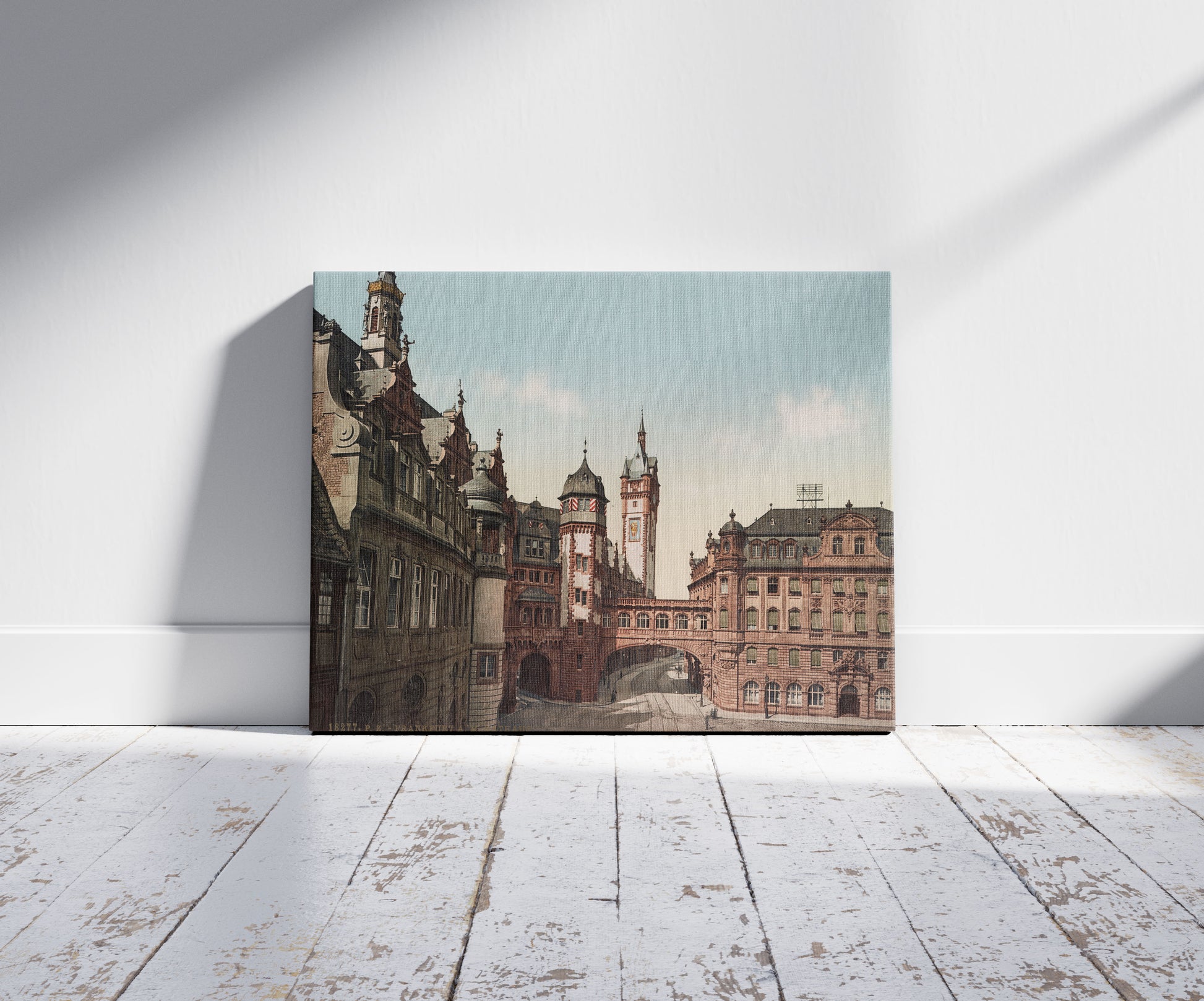 A picture of Frankfurt. A.M. Rathaus, a mockup of the print leaning against a wall