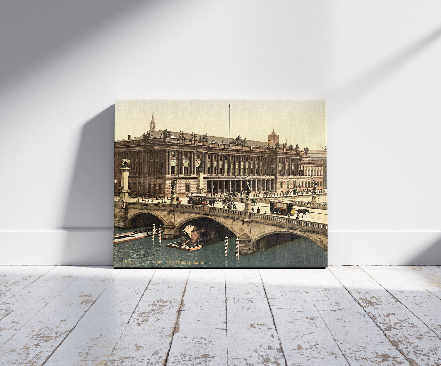 A picture of Frederick's Bridge and the Bourse, Berlin, Germany, a mockup of the print leaning against a wall